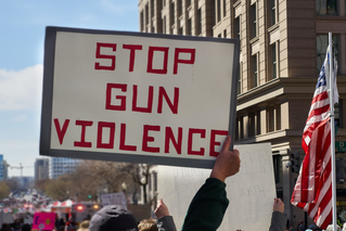 Stop Gun Violence sign at protest