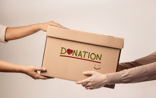 handing over donation box