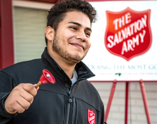 Person ringing bell for the Salvation Army