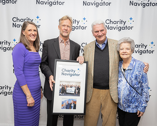 Photo - left to right: Marie Wieck, Chair of the Board; Michael Thatcher, President & CEO, Pat and Marion Duggan, Founders, Charity Navigator