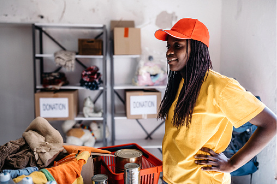An image of a volunteer sorting through donations