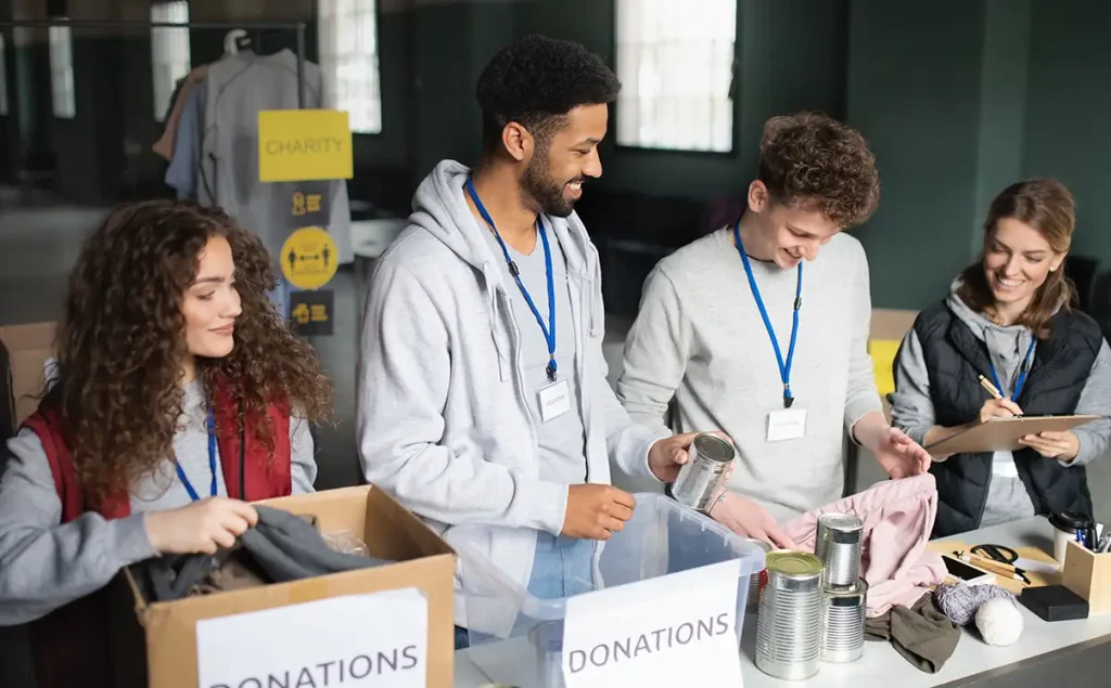 Group of volunteers sorting donations