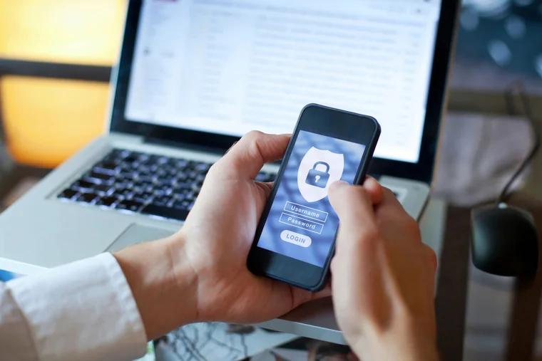 Close-up of someone securing their mobile phone