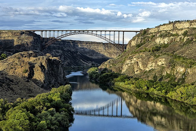 The calm Snake river flows under the Perrine Bridge in Twin Falls, Idaho.