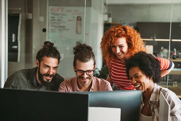 An image of business colleagues working together at a computer