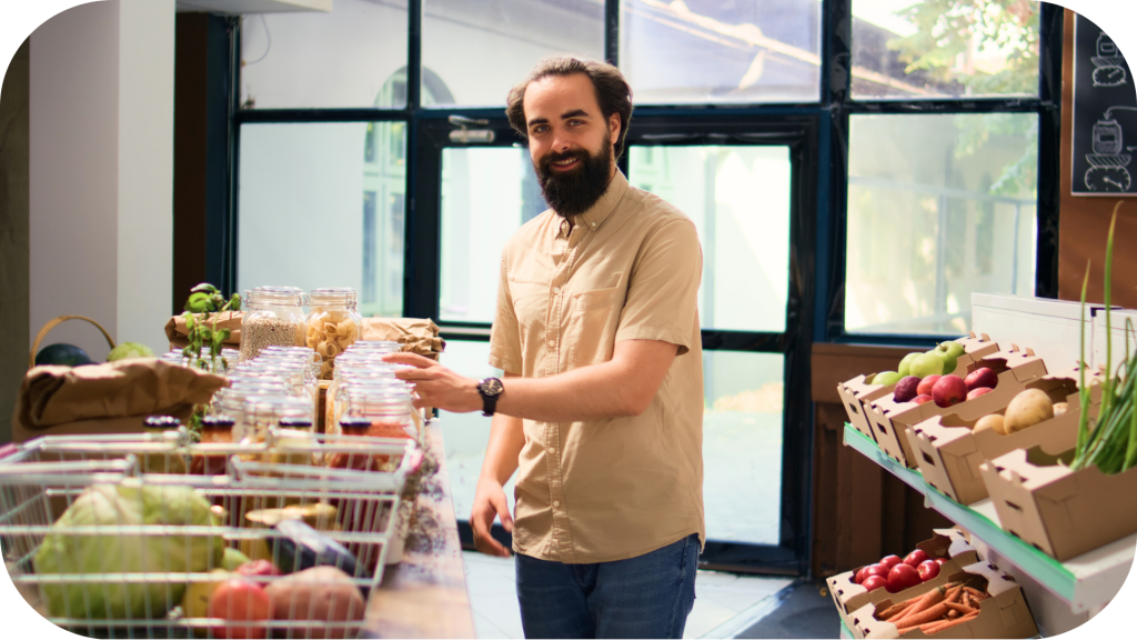 Smiling man in a grocery store